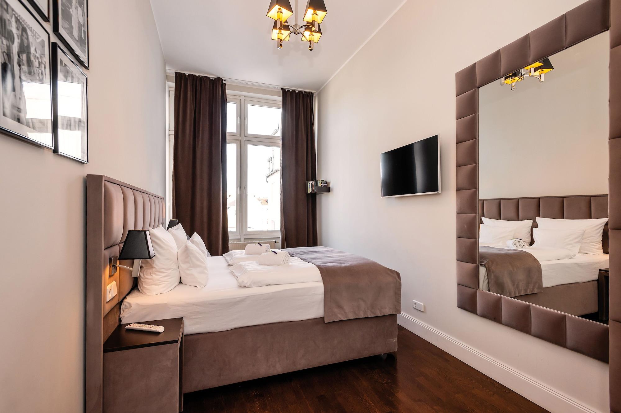 Arabel Design Apartments Berlin Bagian luar foto A room at the hotel
